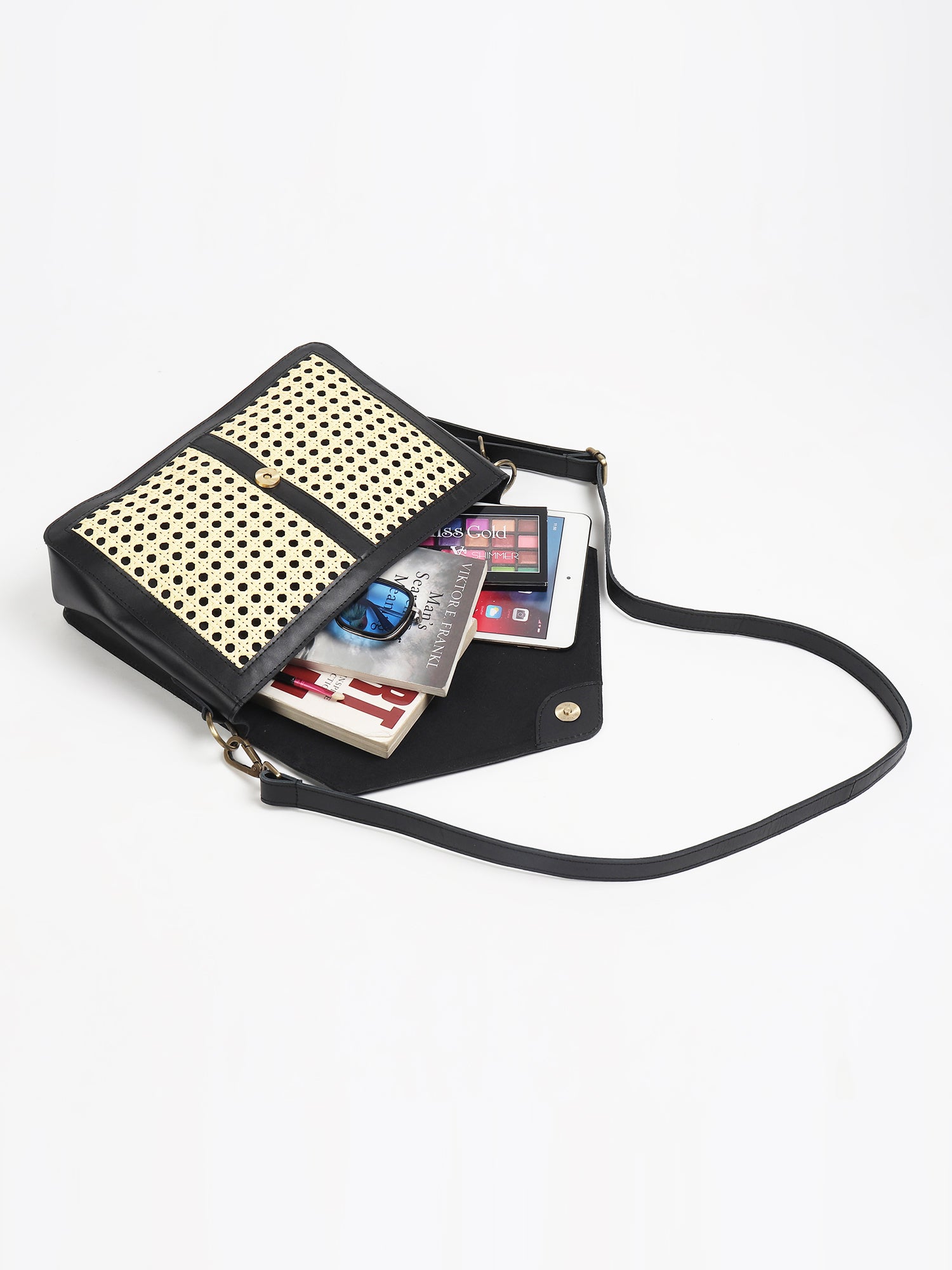 Jaylen cane and leather sling bag closure detail — Art Avenue