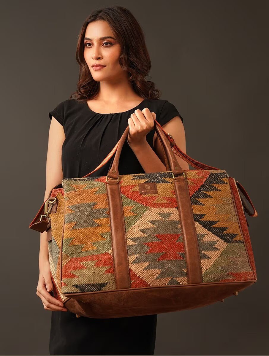 Sharant kilim and leather duffle bag, side view — Art Avenue