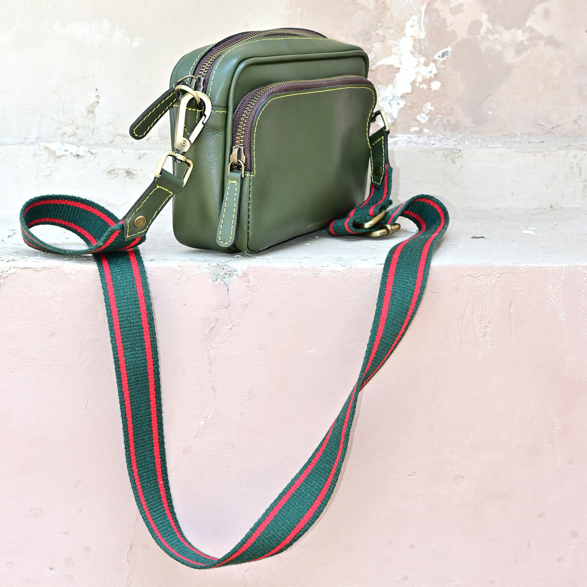 Harisson green leather sling bag — Art Avenue