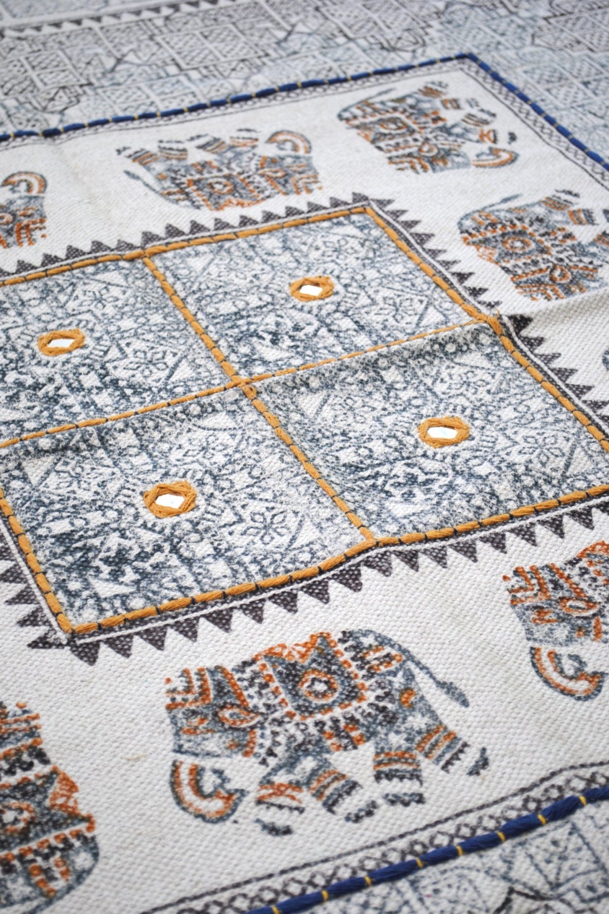 Detail of block-print on white cotton dhurrie rug — Art Avenue