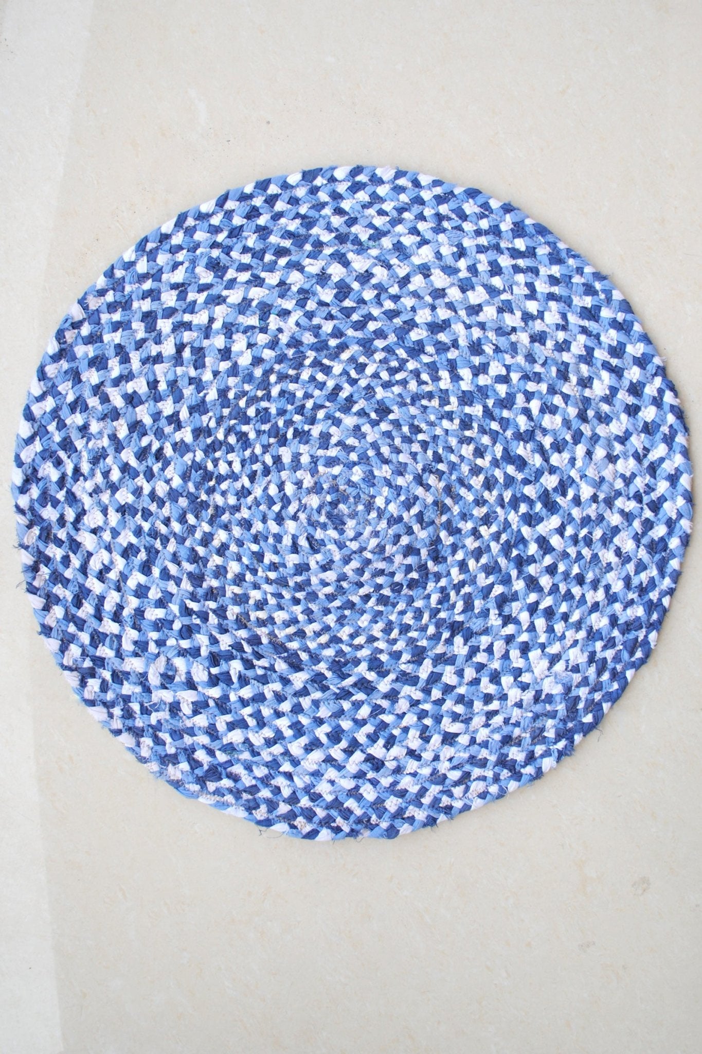 Linaria round braided jute rug — handmade in Jaipur