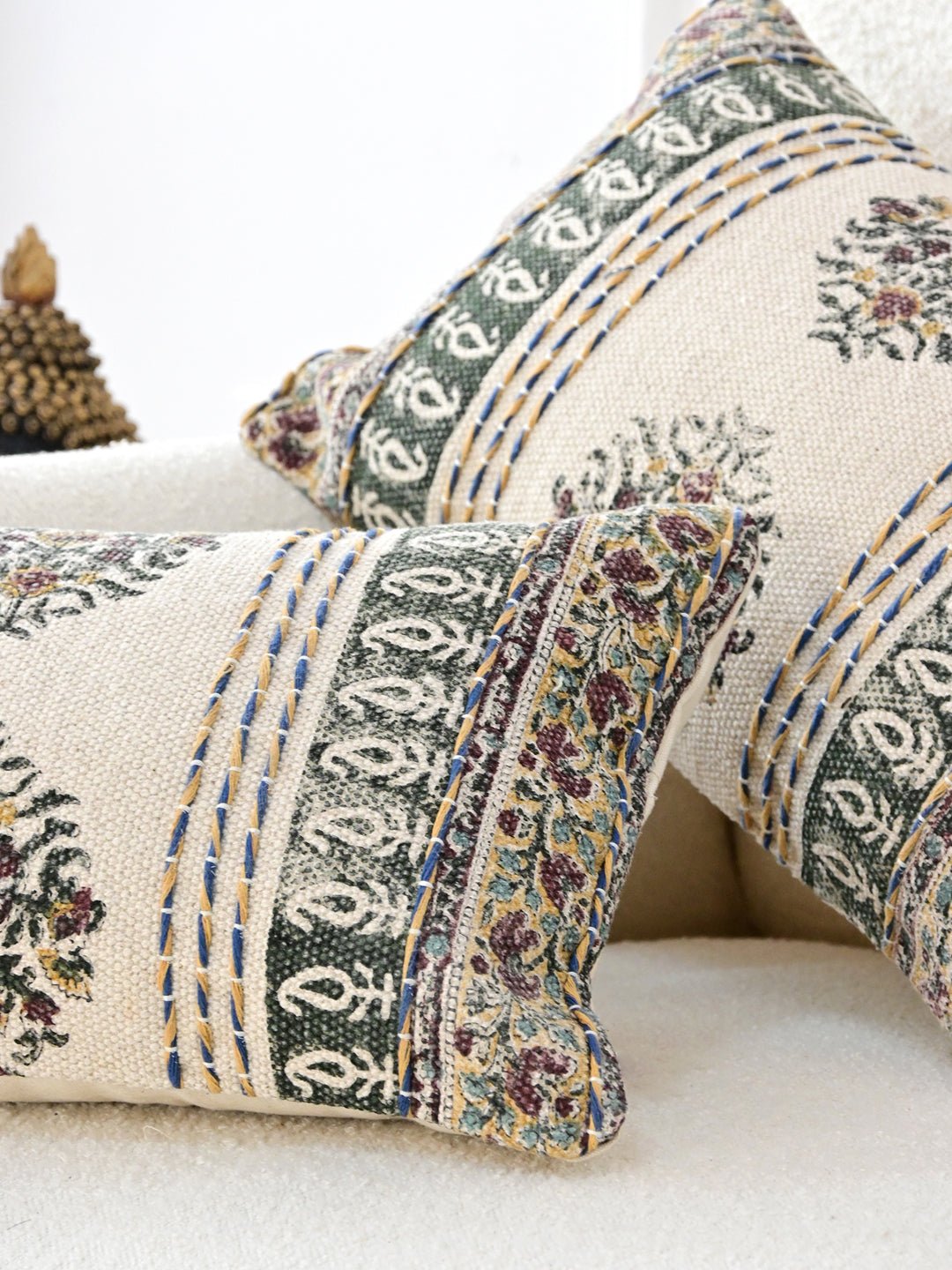 Block-printed embroidered lumbar cushion on sofa — Art Avenue