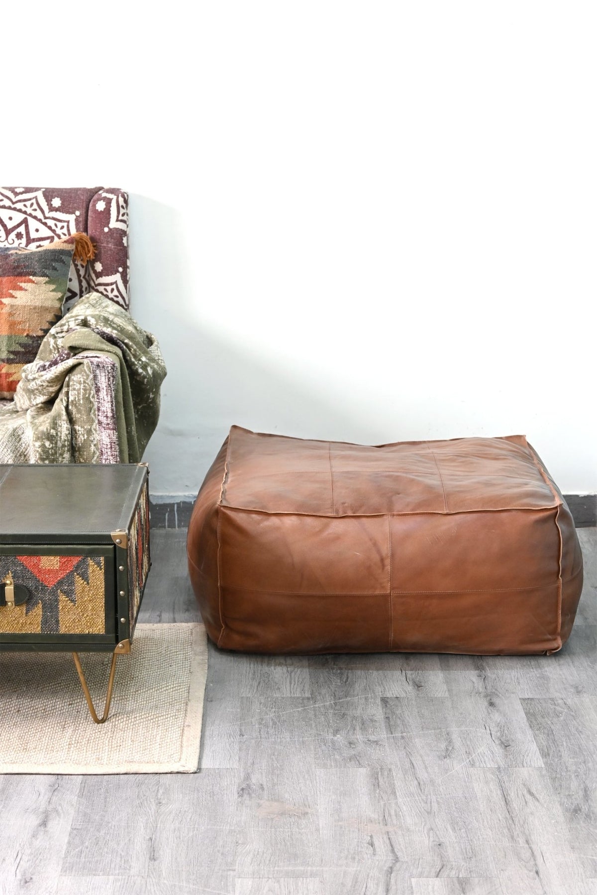 Harper leather pouf — hand-stitched panel detail — Art Avenue