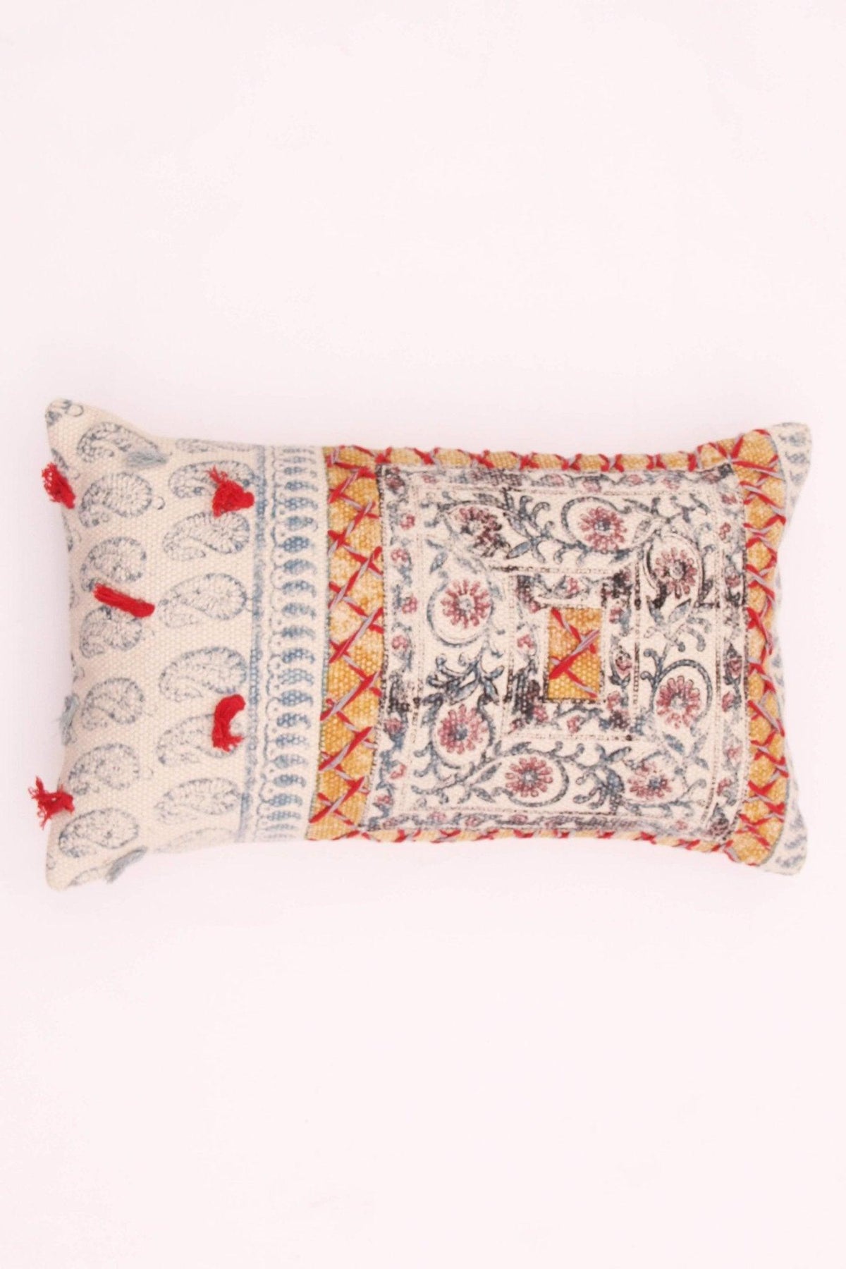 Block-printed embroidered lumbar cushion on sofa — Art Avenue