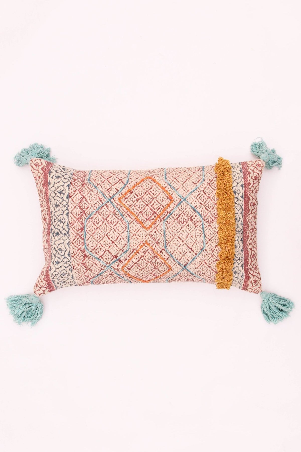 Block-printed embroidered lumbar cushion on sofa — Art Avenue