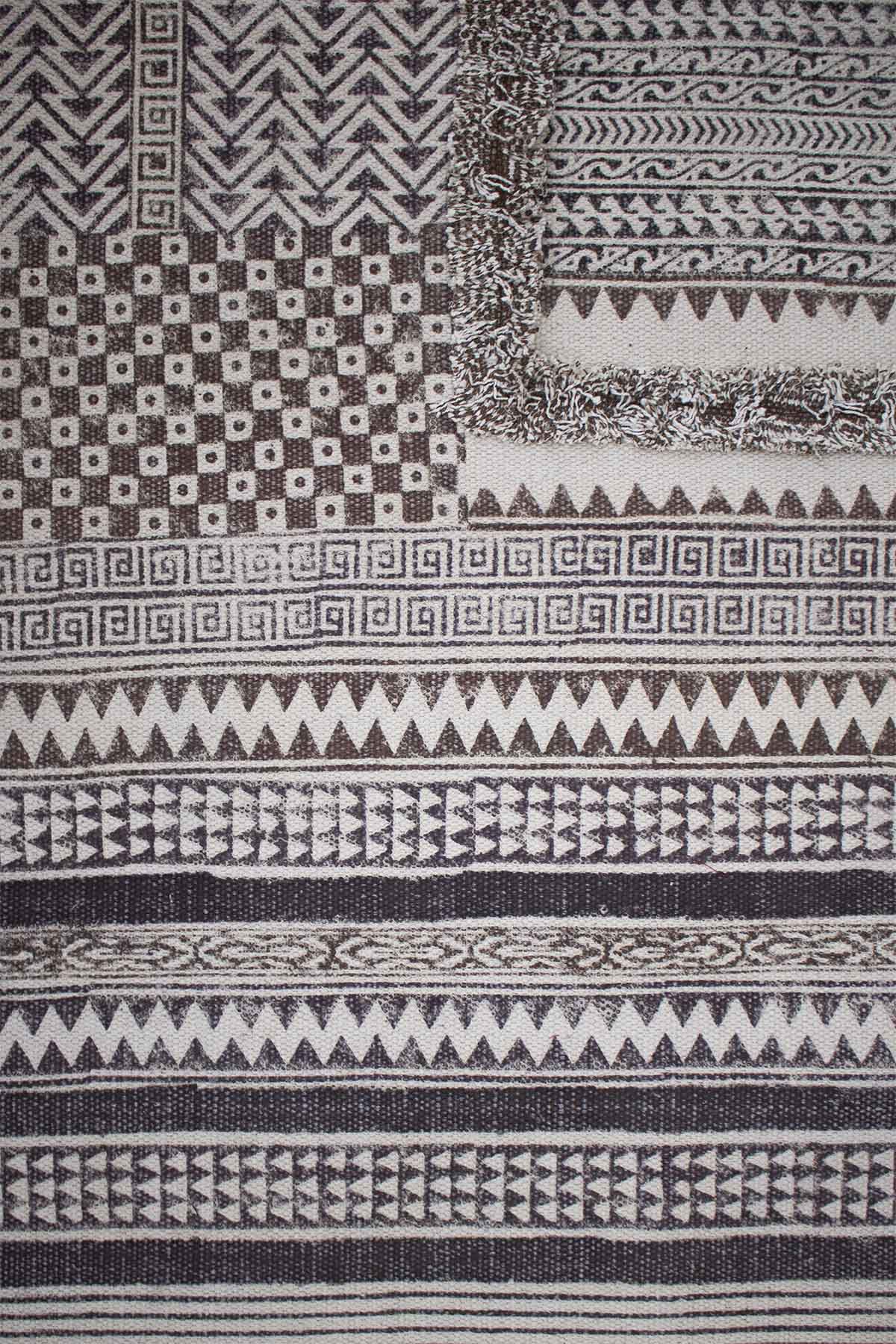 Block-printed cotton dhurrie rug in room setting — Art Avenue