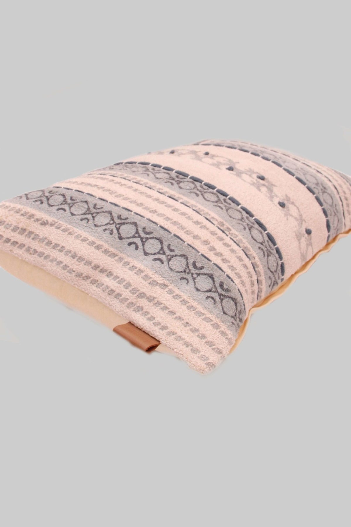 Detail of block-print embroidery on ivory lumbar cushion cover — Art Avenue