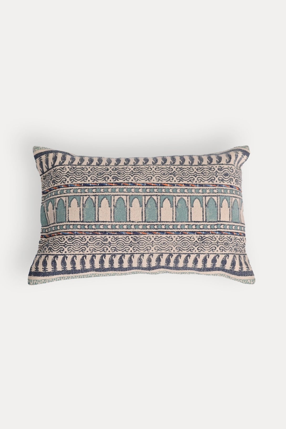 Block-printed embroidered lumbar cushion on sofa — Art Avenue