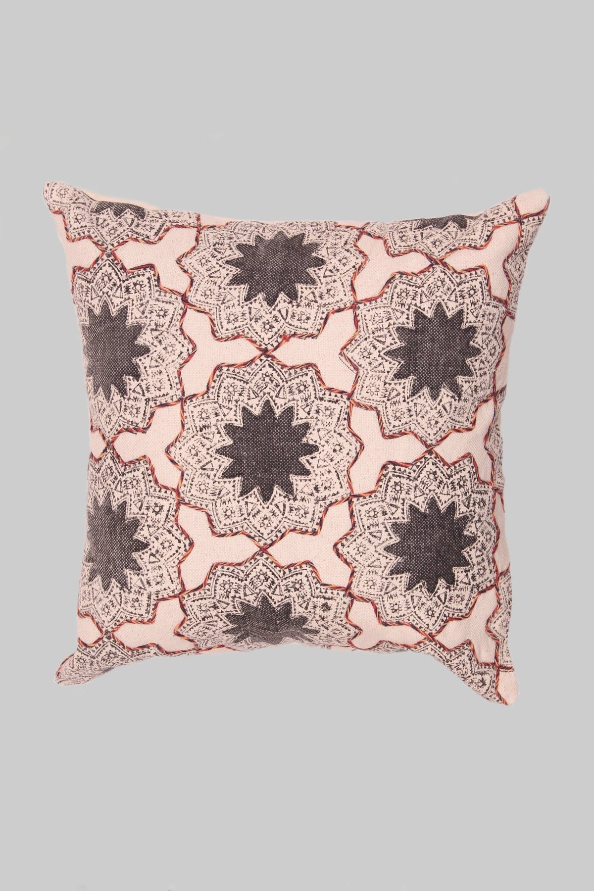 Block-printed square cushion on sofa — Art Avenue