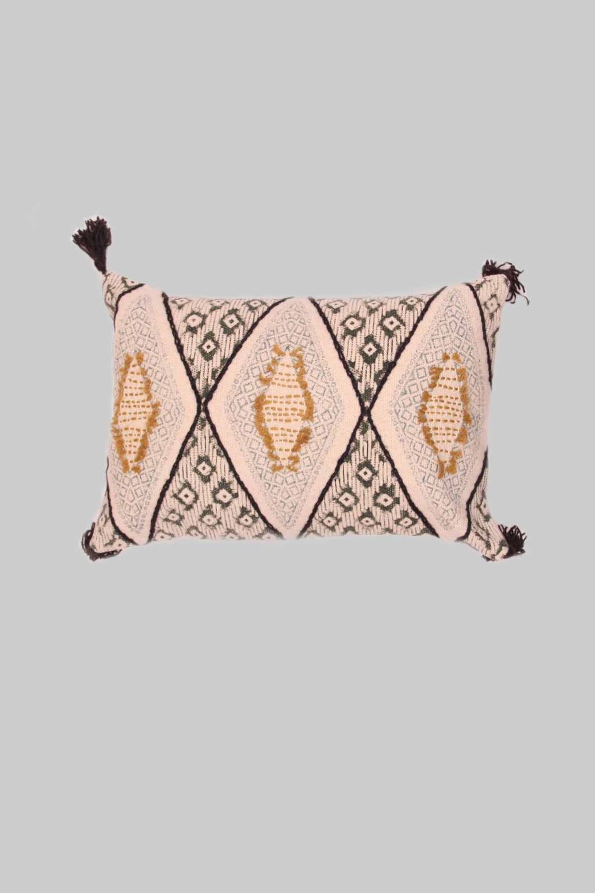 Block-printed embroidered lumbar cushion on sofa — Art Avenue