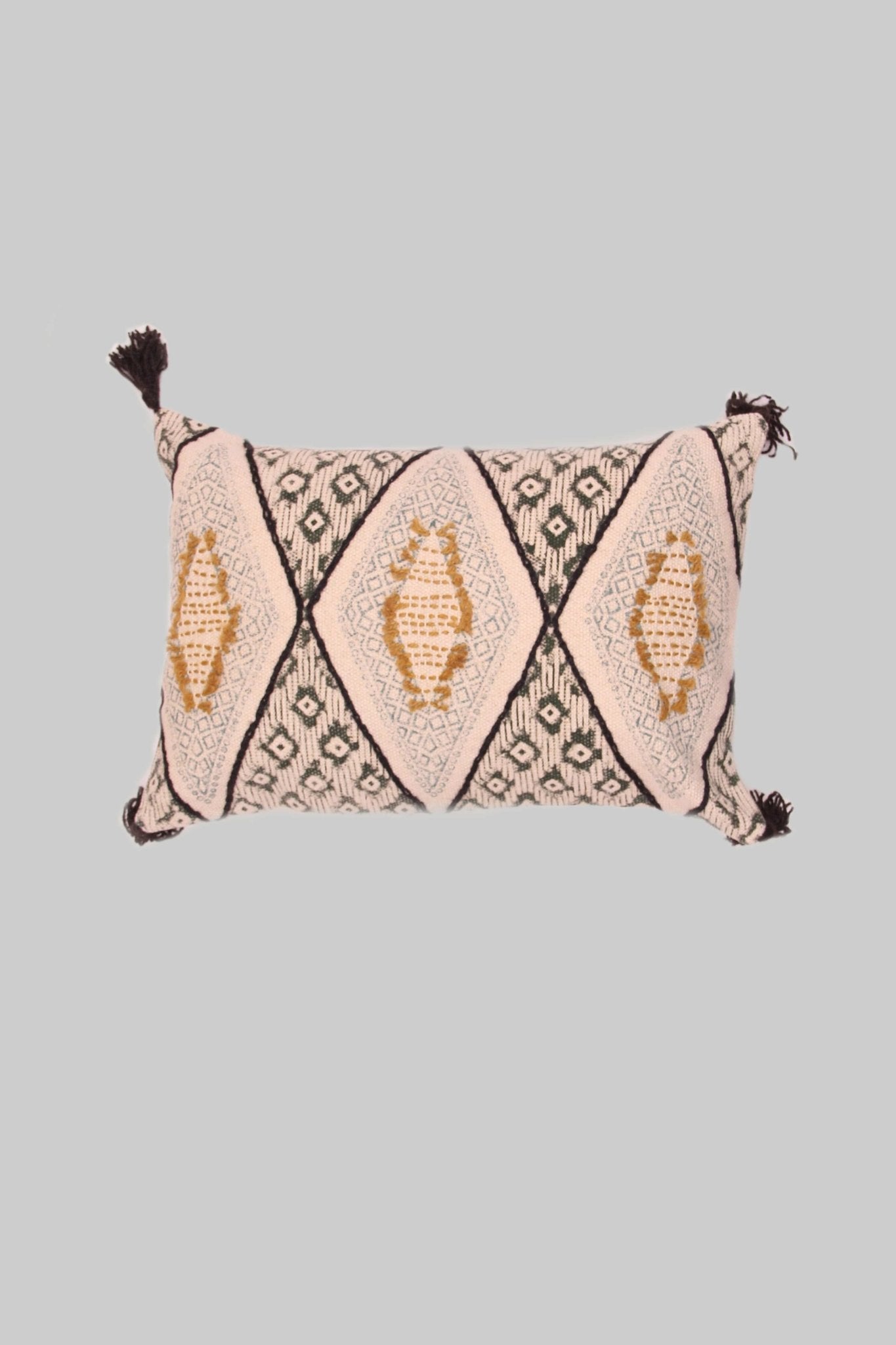 Block-printed embroidered lumbar cushion on sofa — Art Avenue