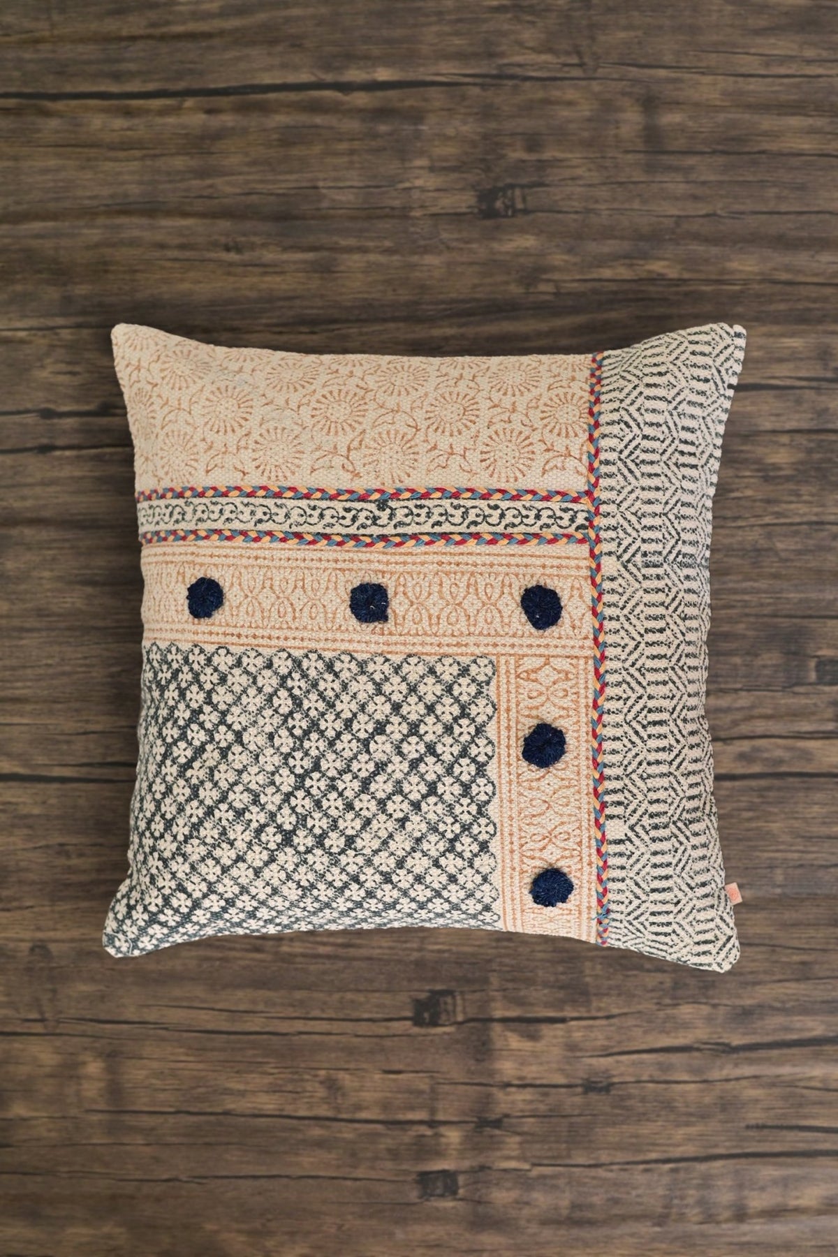 Block-printed square cushion on sofa — Art Avenue