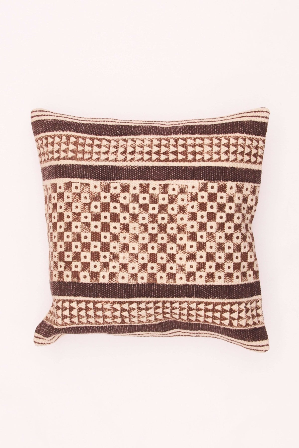 Block-printed square cushion on sofa — Art Avenue