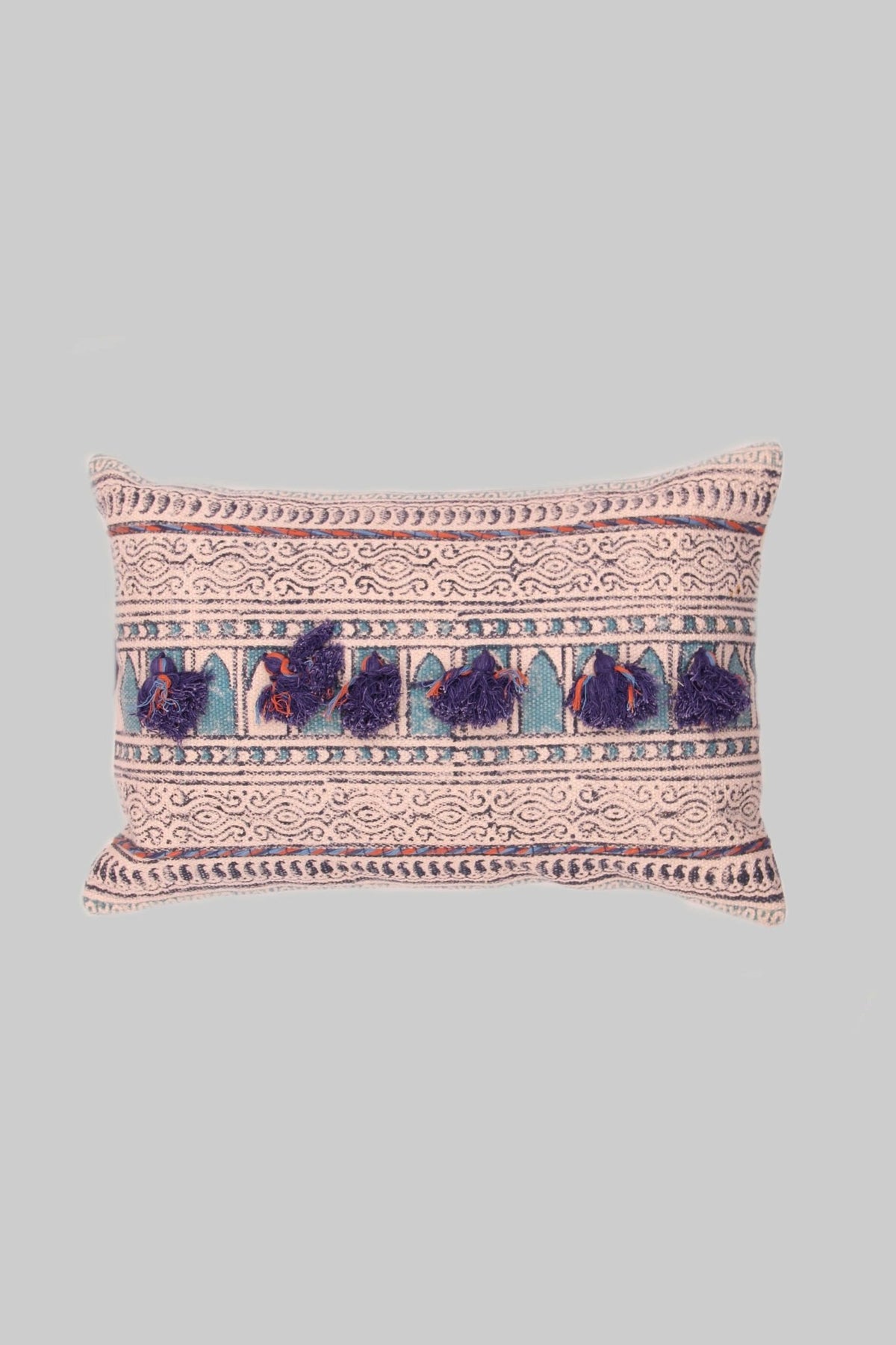 Block-printed embroidered lumbar cushion on sofa — Art Avenue