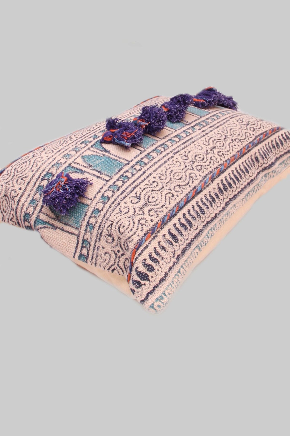 Detail of block-print embroidery on purple lumbar cushion cover — Art Avenue