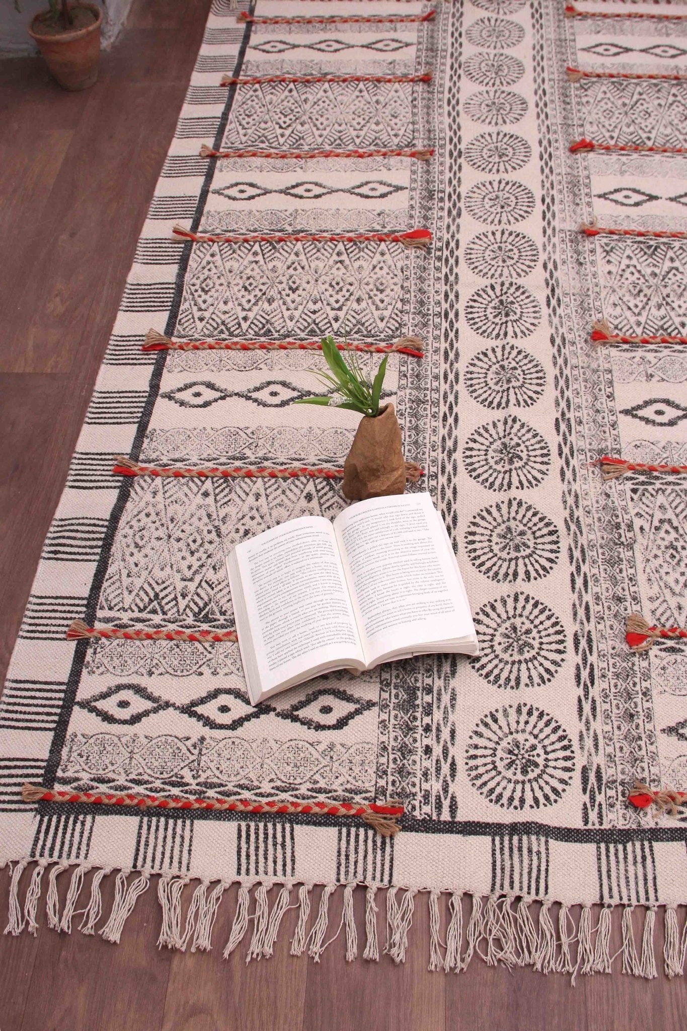 Detail of block-print on black dhurrie rug — Art Avenue