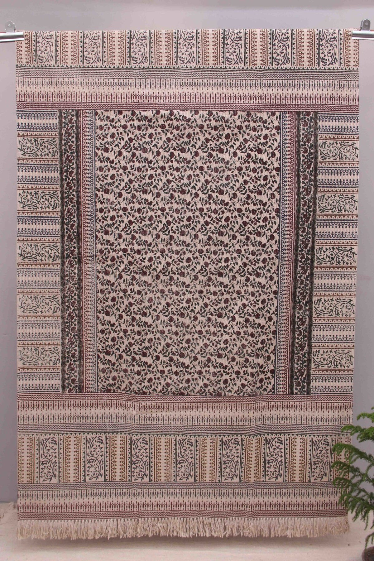 Block-printed cotton dhurrie rug in room setting — Art Avenue