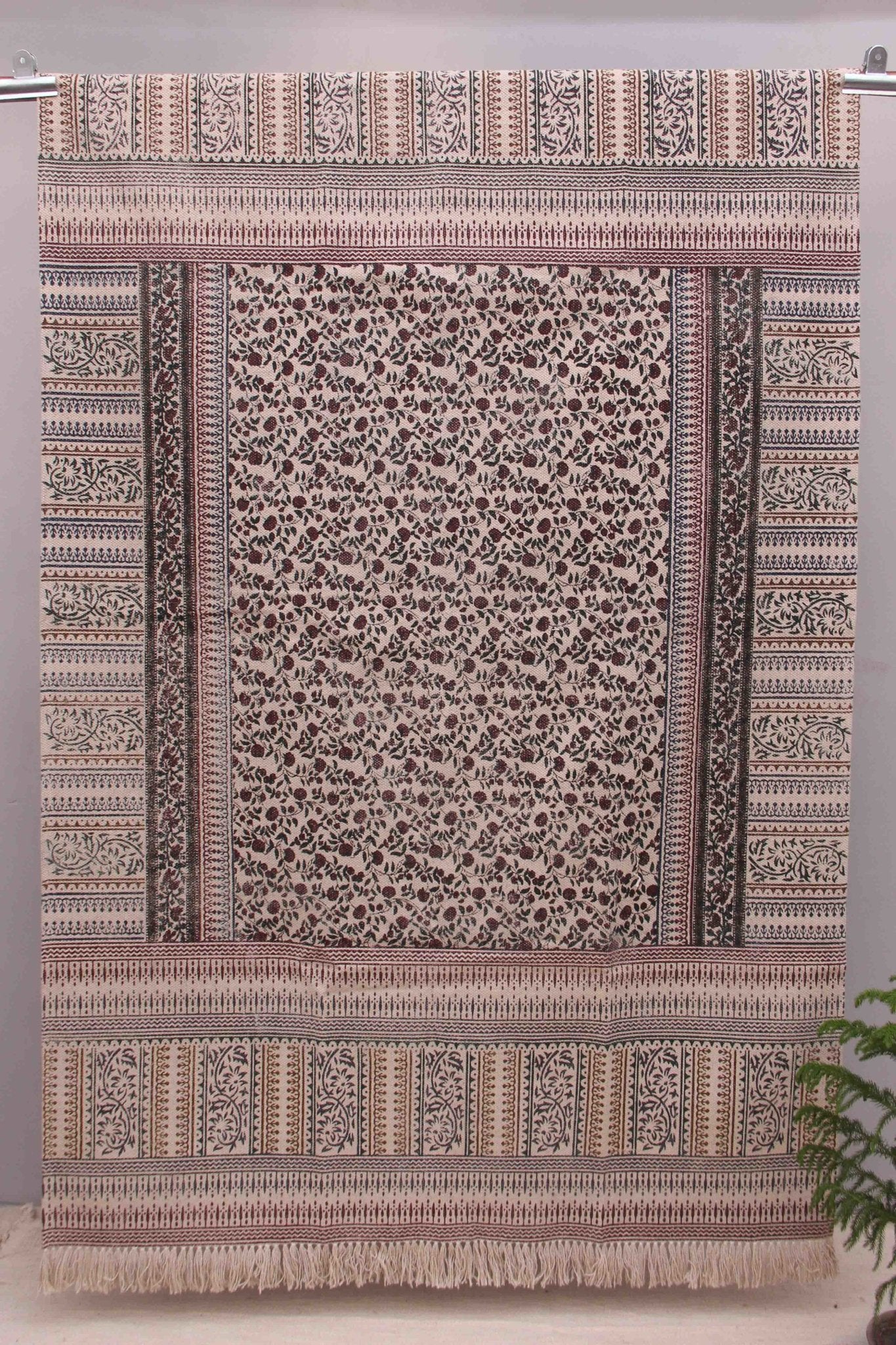Block-printed cotton dhurrie rug in room setting — Art Avenue