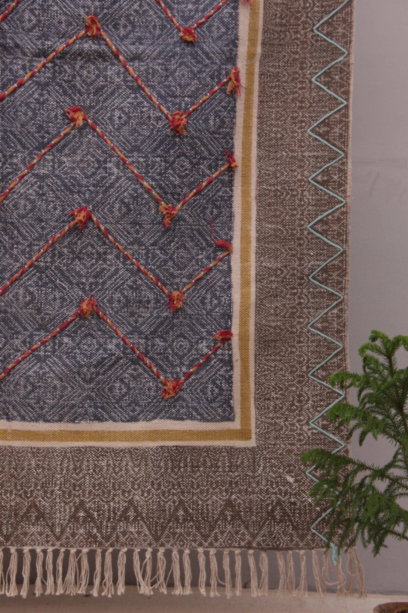 Detail of block-print on blue and grey dhurrie rug — Art Avenue