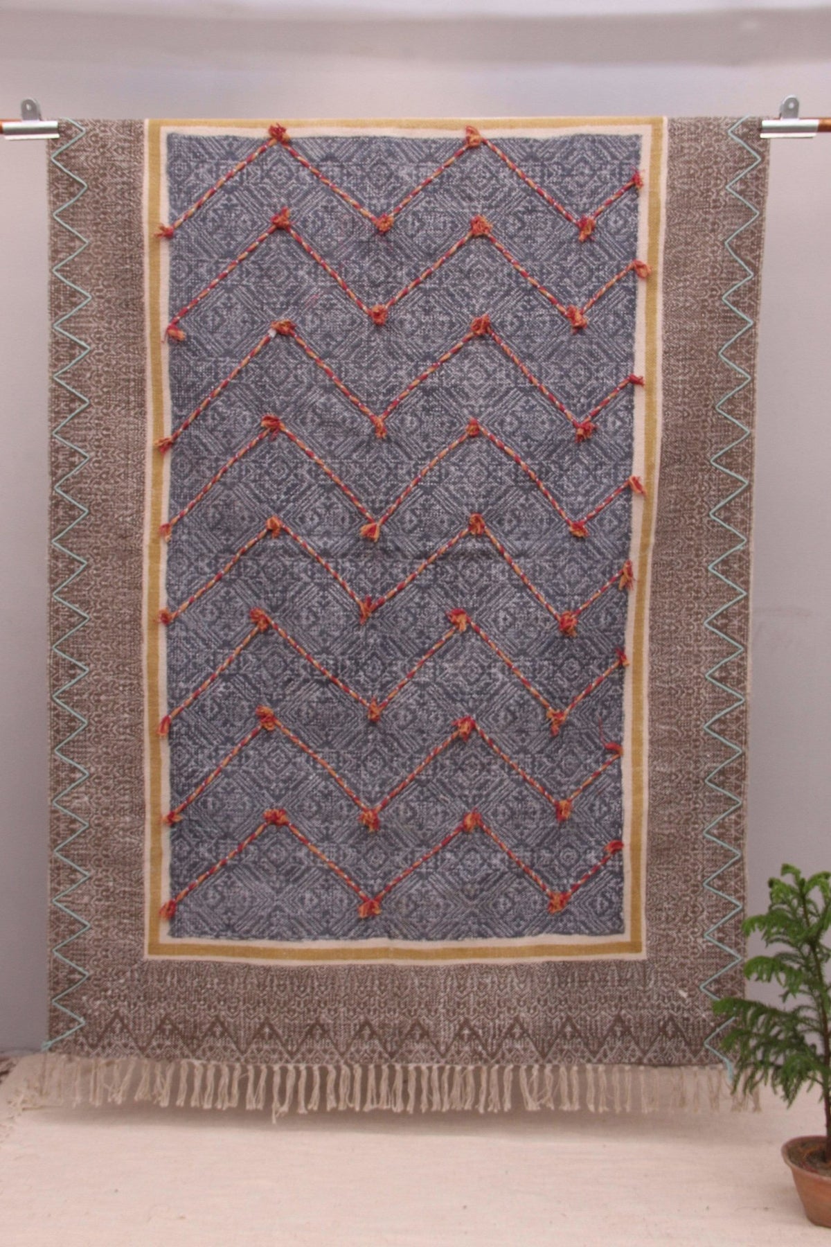 Block-printed cotton dhurrie rug in room setting — Art Avenue