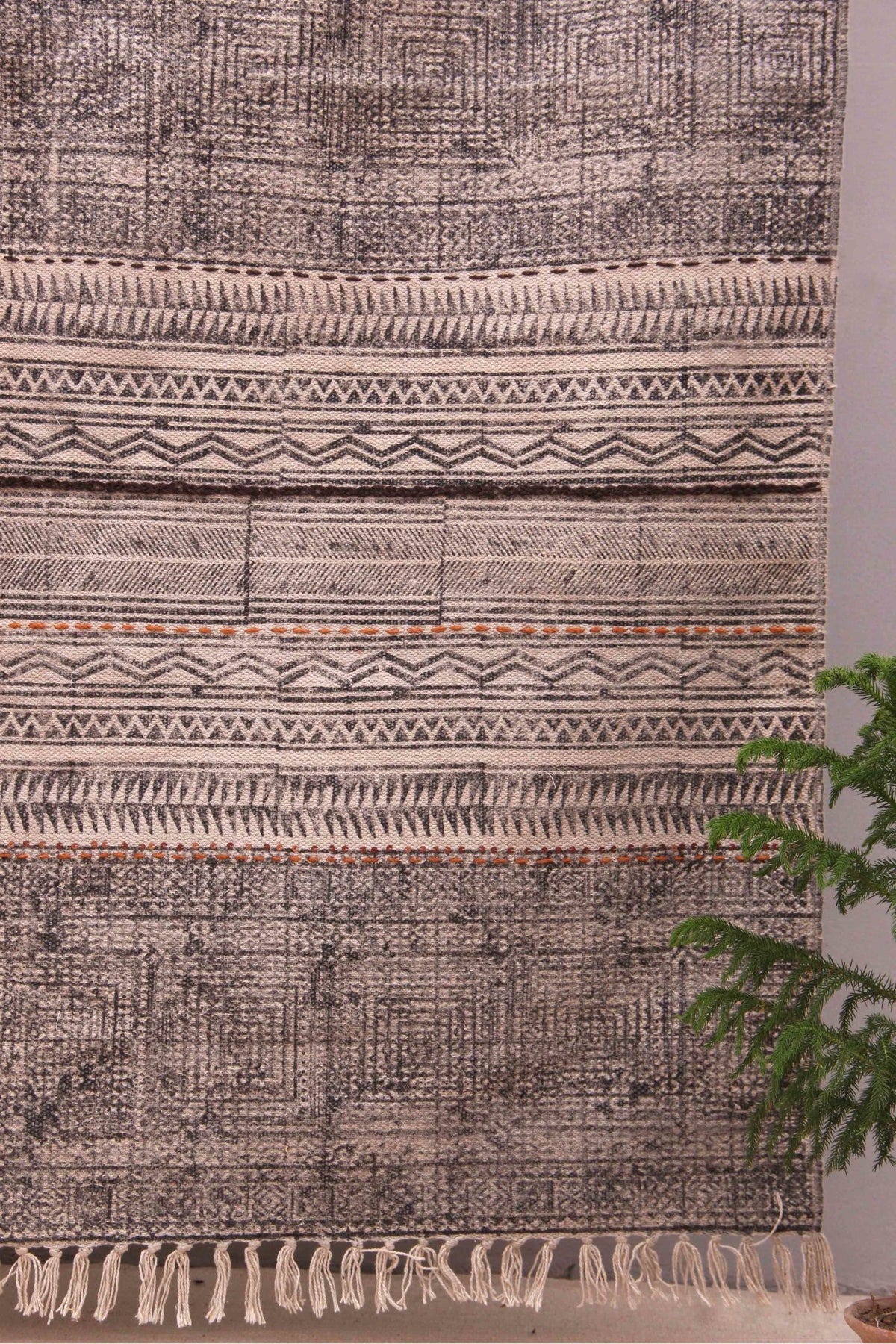 Detail of block-print on black dhurrie rug — Art Avenue