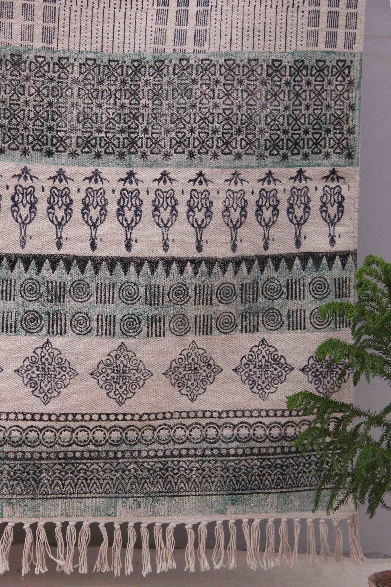 Block-printed cotton dhurrie rug in room setting — Art Avenue