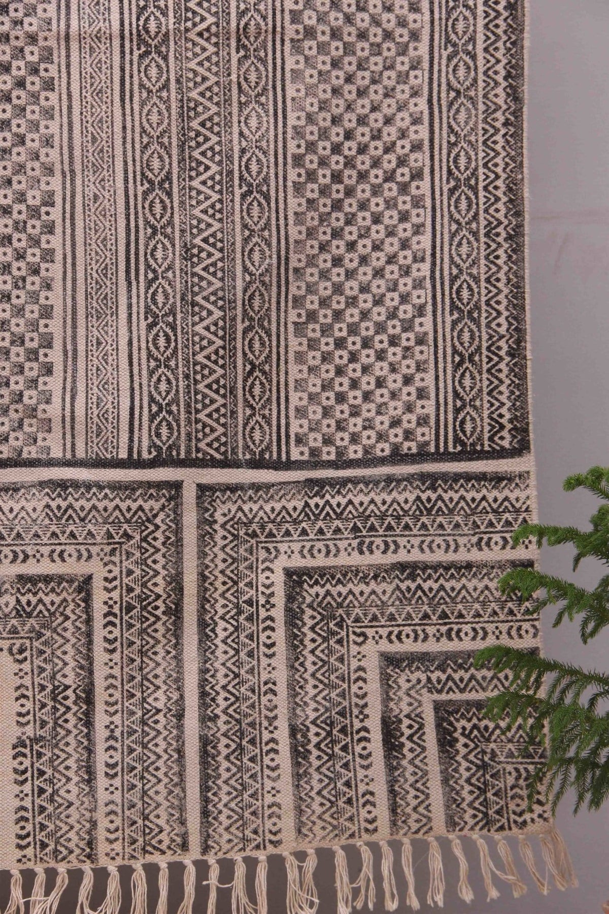 Detail of block-print on black dhurrie rug — Art Avenue
