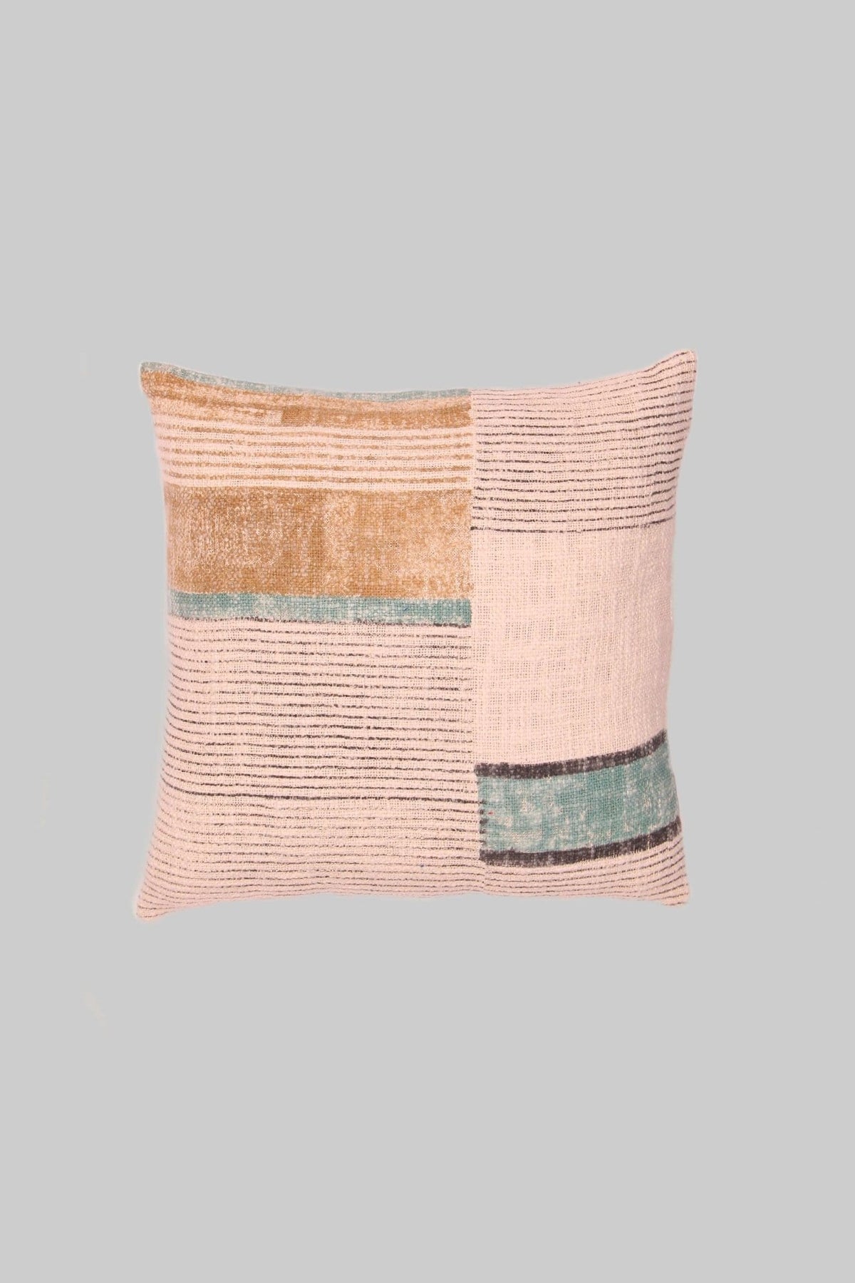 Block-printed square cushion on sofa — Art Avenue