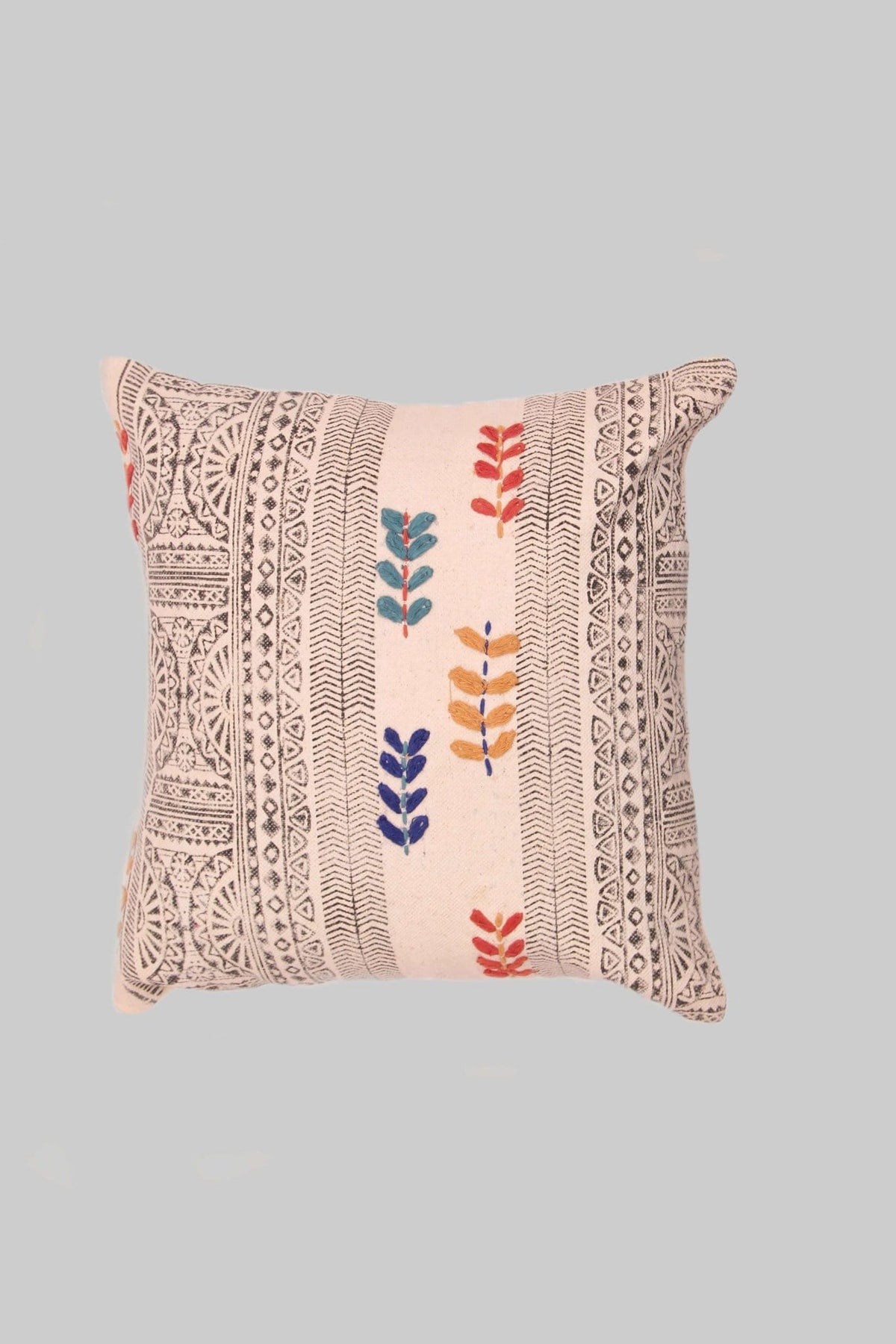 Block-printed square cushion on sofa — Art Avenue