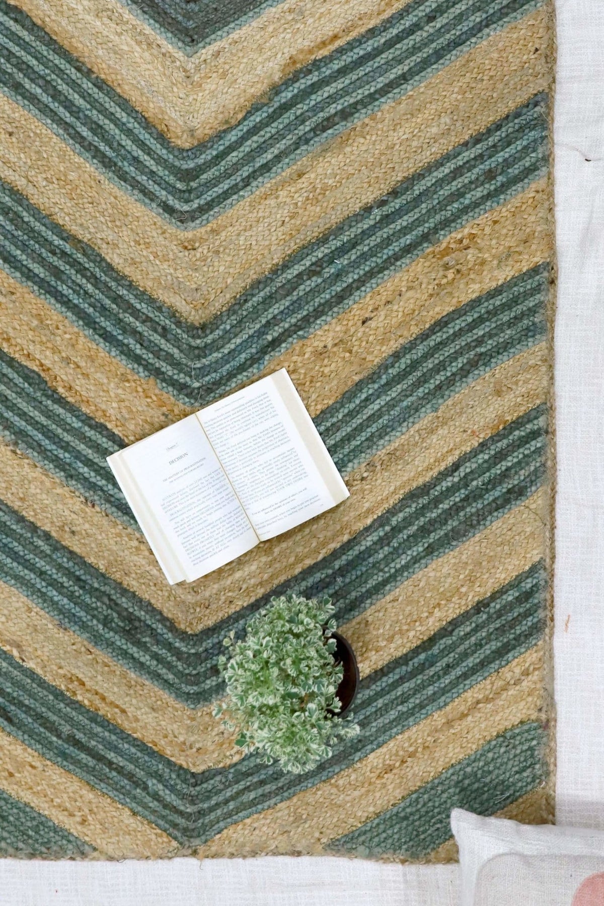 Virgo jute woven rug room setting — Art Avenue